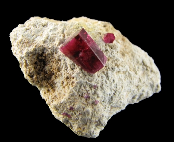 Red Beryl on rhyolite from Violet Claims, Wah Wah mountains, Utah [db_pics/pics/redberyl2c.jpg]