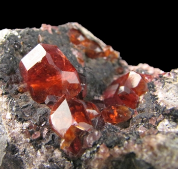 Rhodochrosite on matrix from Uchucchacua Mine, Oyon Prov., Lima Dept., Peru [db_pics/pics/rhodochrosite1c.jpg]