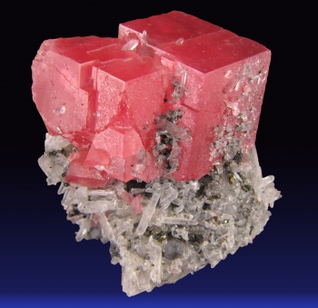 Rhodochrosite on Quartz with Pyrite from Sweet Home Mine, Alma, Colorado [db_pics/pics/rhodochrosite2a.jpg]