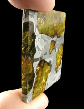 Meteorite Slice Var. Stony Iron, pallasite from Fukang, Xinjiang Province, China [db_pics/pics/fukang2c.jpg]