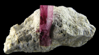 Red Beryl on rhyolite from Violet Claims, Wah Wah mountains, Utah [db_pics/pics/redberyl1e.jpg]