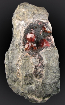 Rhodochrosite on matrix from Uchucchacua Mine, Oyon Prov., Lima Dept., Peru [db_pics/pics/rhodochrosite1a.jpg]