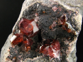 Rhodochrosite on matrix from Uchucchacua Mine, Oyon Prov., Lima Dept., Peru [db_pics/pics/rhodochrosite1b.jpg]